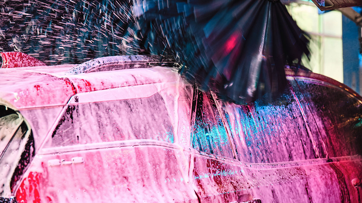 A car wash running with the right mix of car wash chemicals